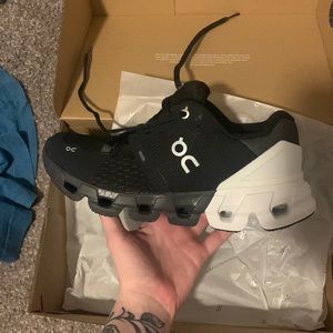 Black and white oncloud sneakers